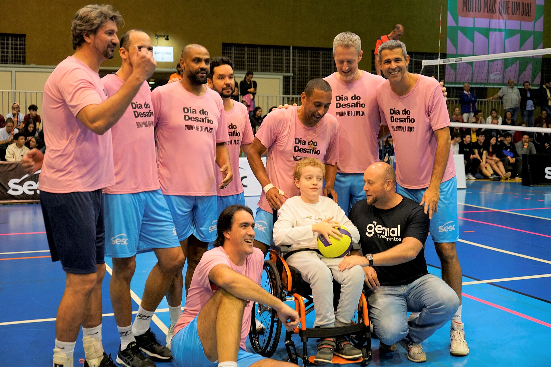 Dante com um jovem atleta em cadeira de rodas